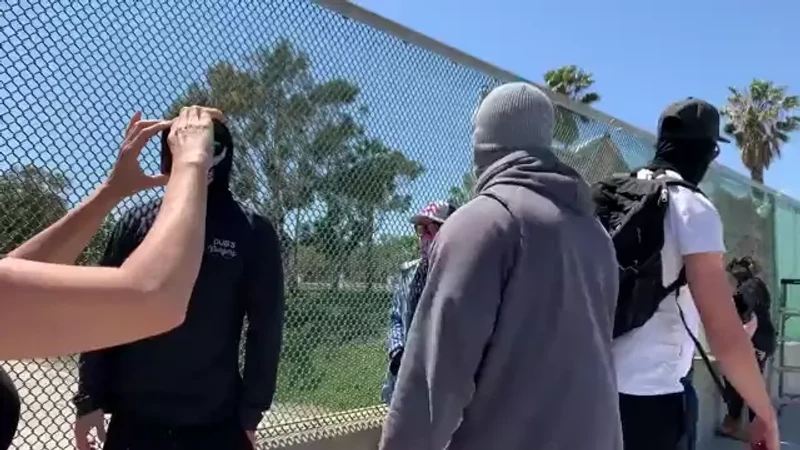 WLM Banner Drop Video 3 Costa Mesa California Twitter Apr 23 2022_Robert Wheldon Confronts Reporters.mp4 _#43